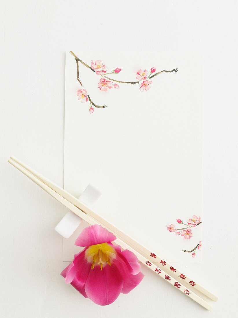 Close up of chopsticks with flowers
