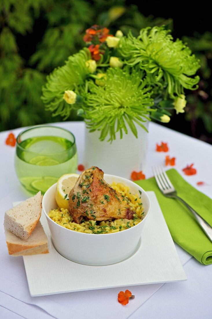 Chicken with lemon and garlic on a bed of risotto