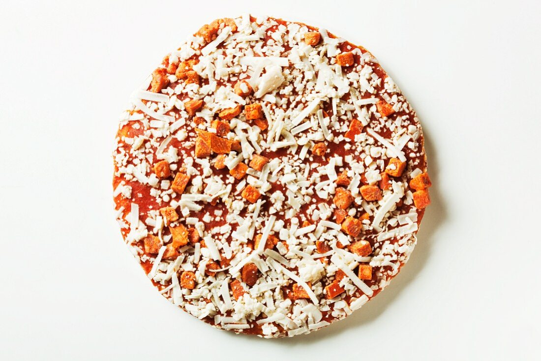 Whole Frozen Pizza on a White Background