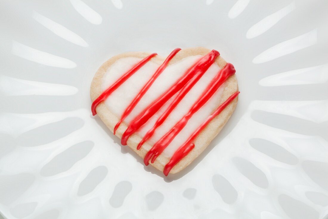 Heart-shaped biscuits with red icing