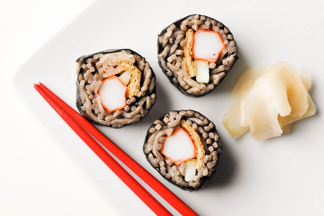 Brown Rice Sushi with Ginger and Chopsticks