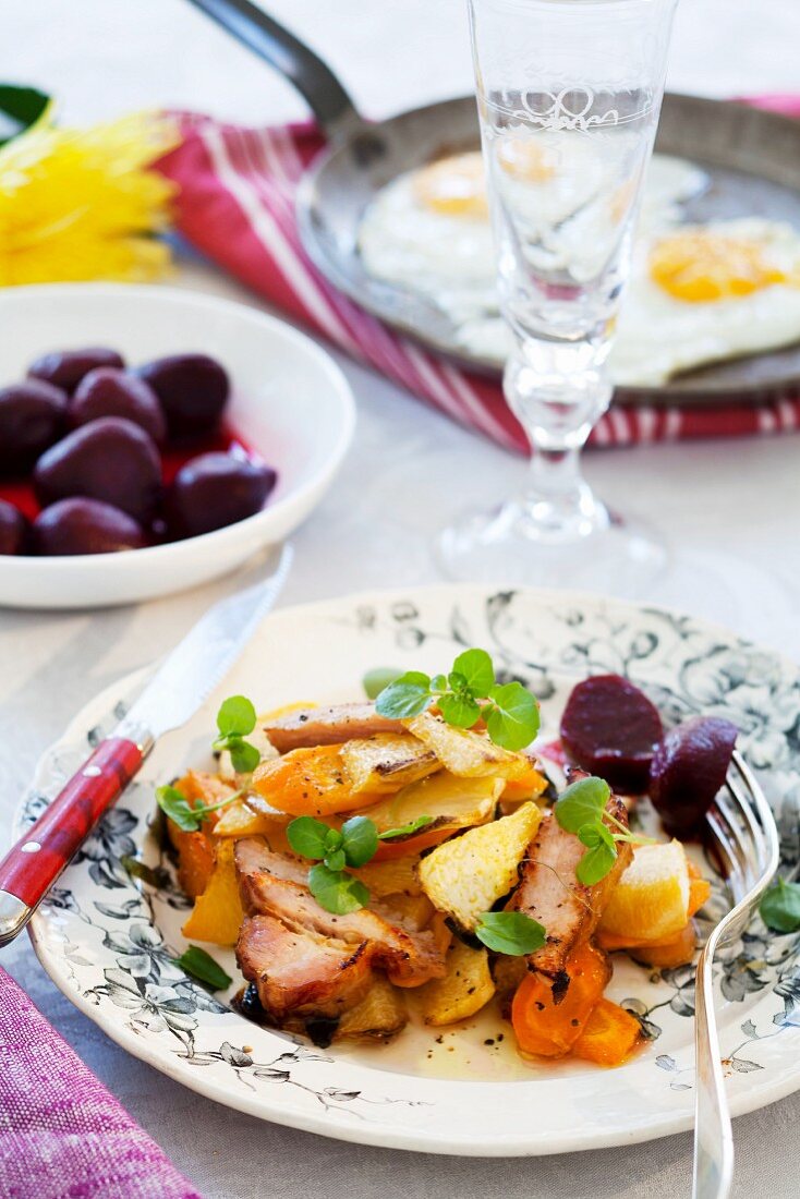 Smoked pork with root vegetables and beetroot