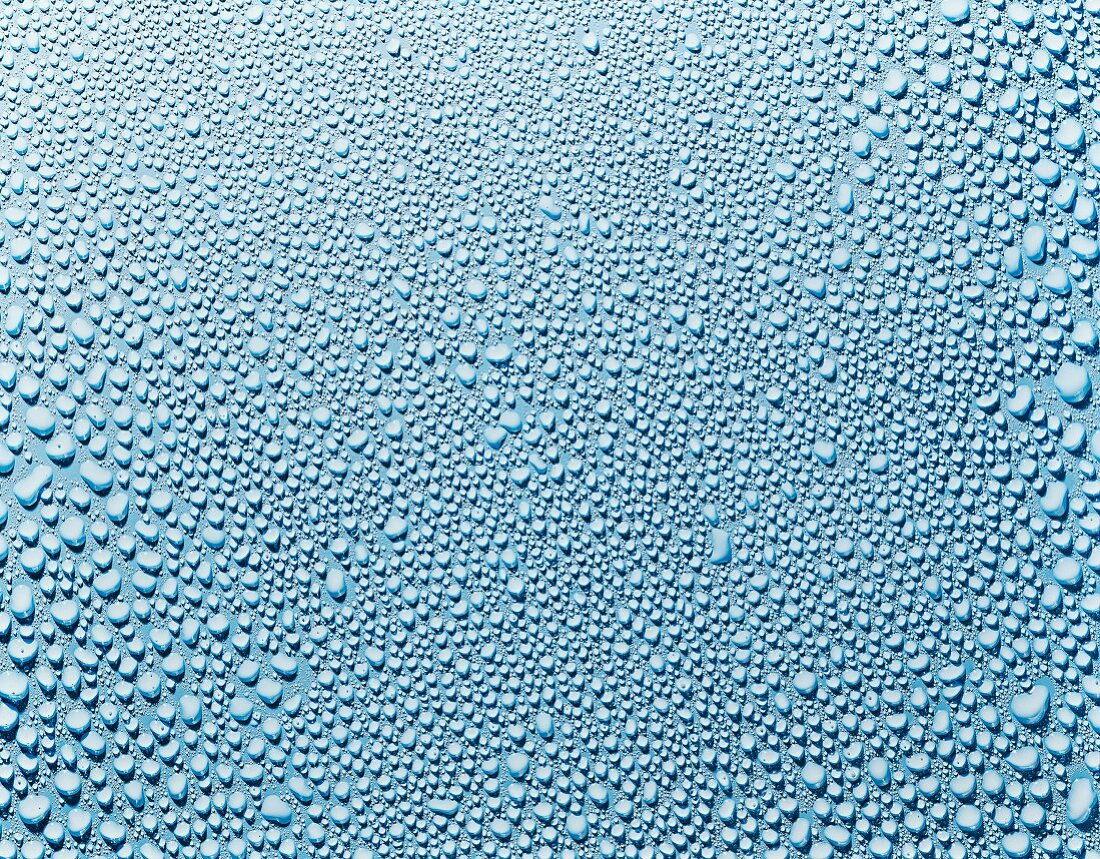 Water droplets on a blue surface