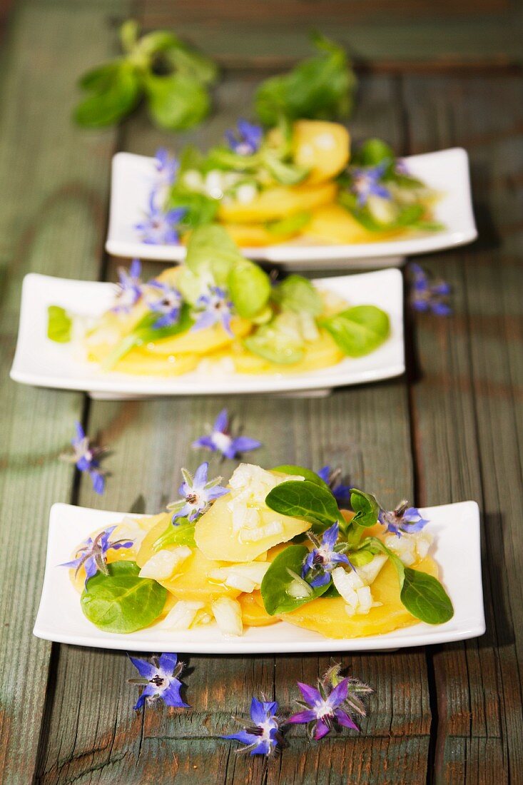 Potato salad with borrage flowers