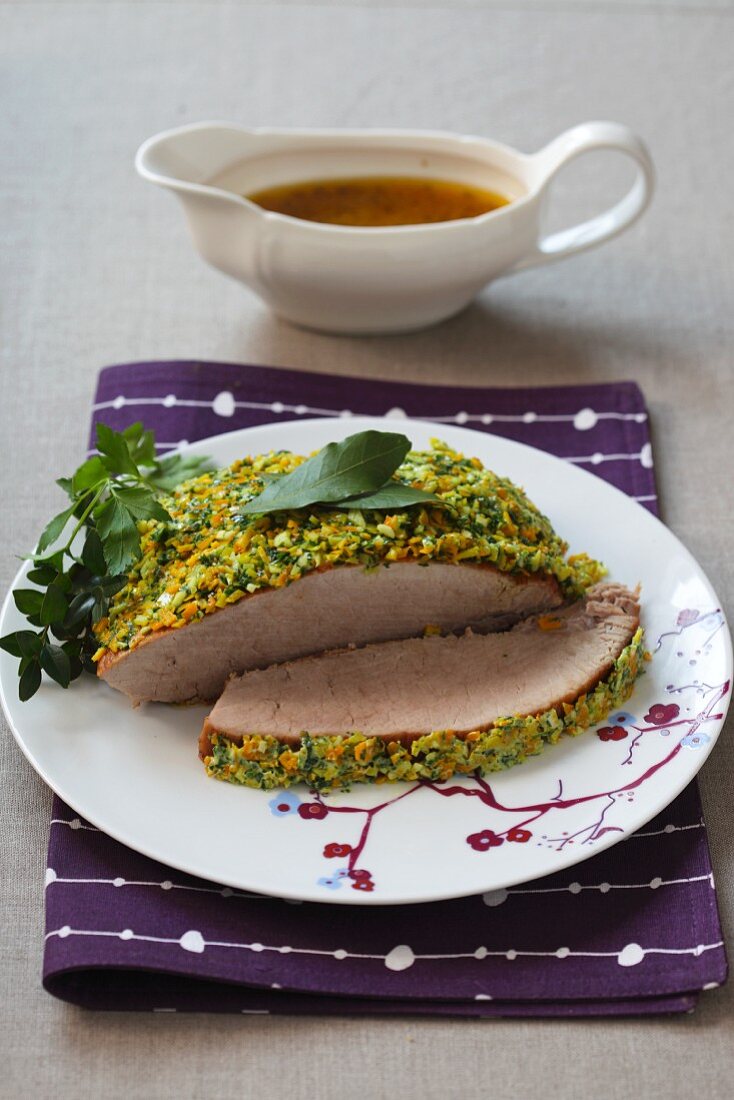 Roast pork with a vegetable crust and gravy