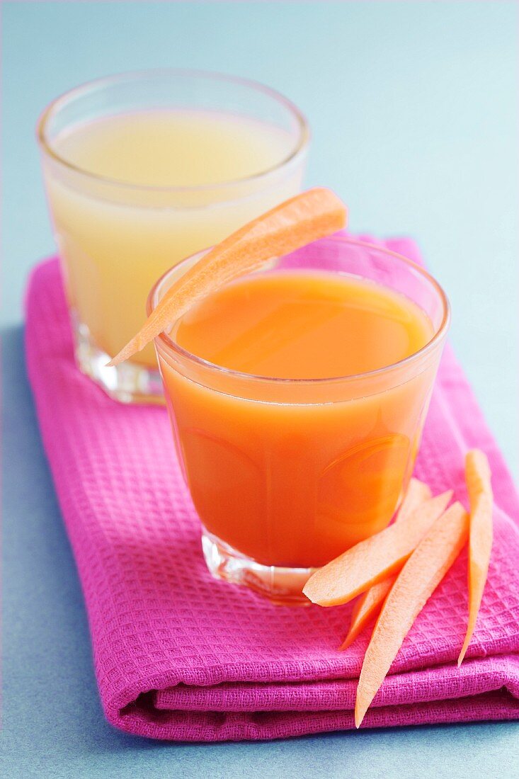 Carrot and pear juice and freshly pressed apple juice