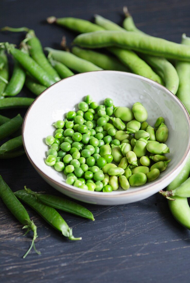 A bowl of freshly shelled beans and peas