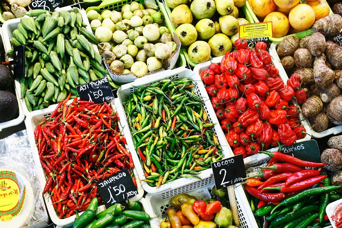 Many Peppers in Crates at the La Boqueria Market in Barcelona, Spain