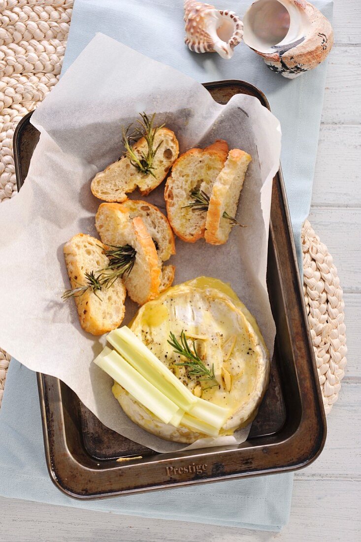 Baked Camembert with rosemary baguettes and celery