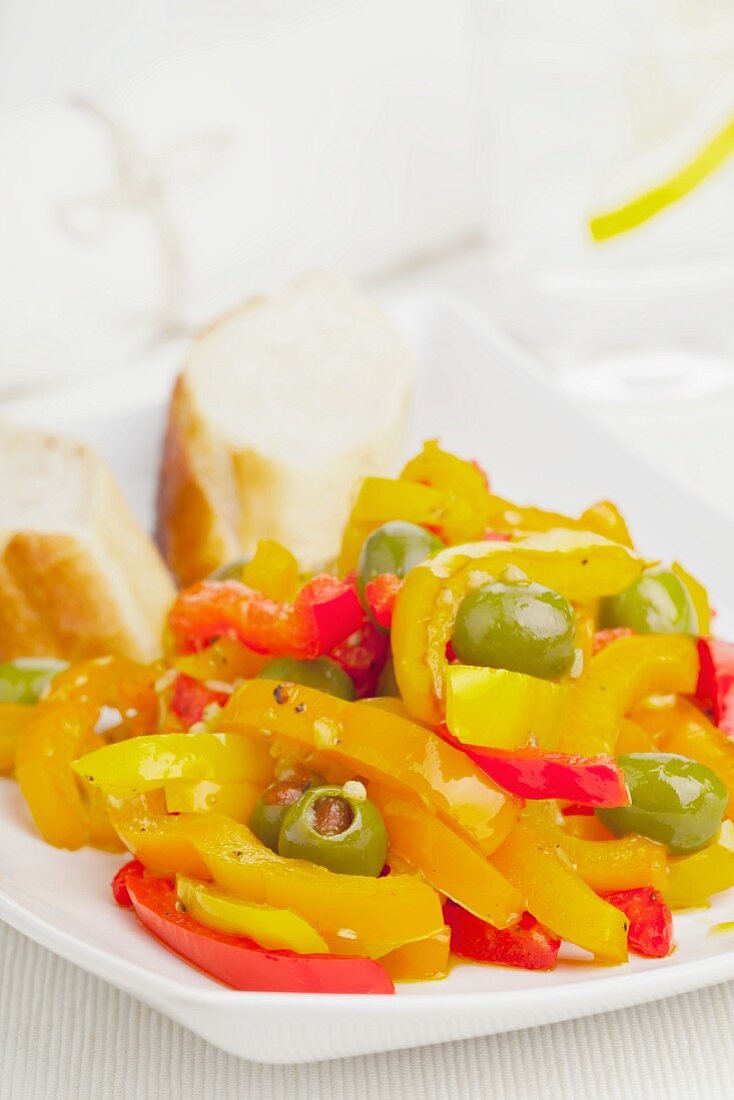 Peperonata made from peppers, olives and garlic