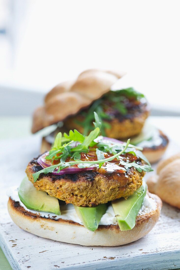 Carrot and sesame seed burger with avocado