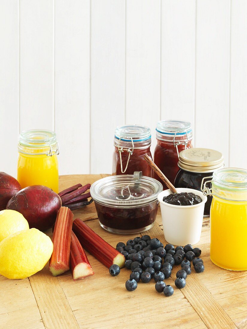 Various jars of jam and fruit