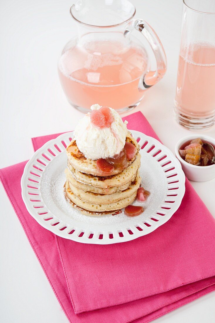Pancakes with yogurt ice cream and rhubarb compote