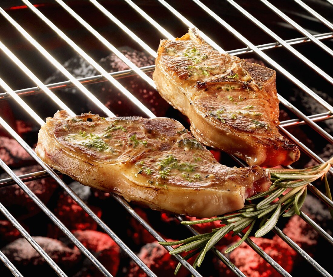 Lamb cutlets with herb marinade on the grill
