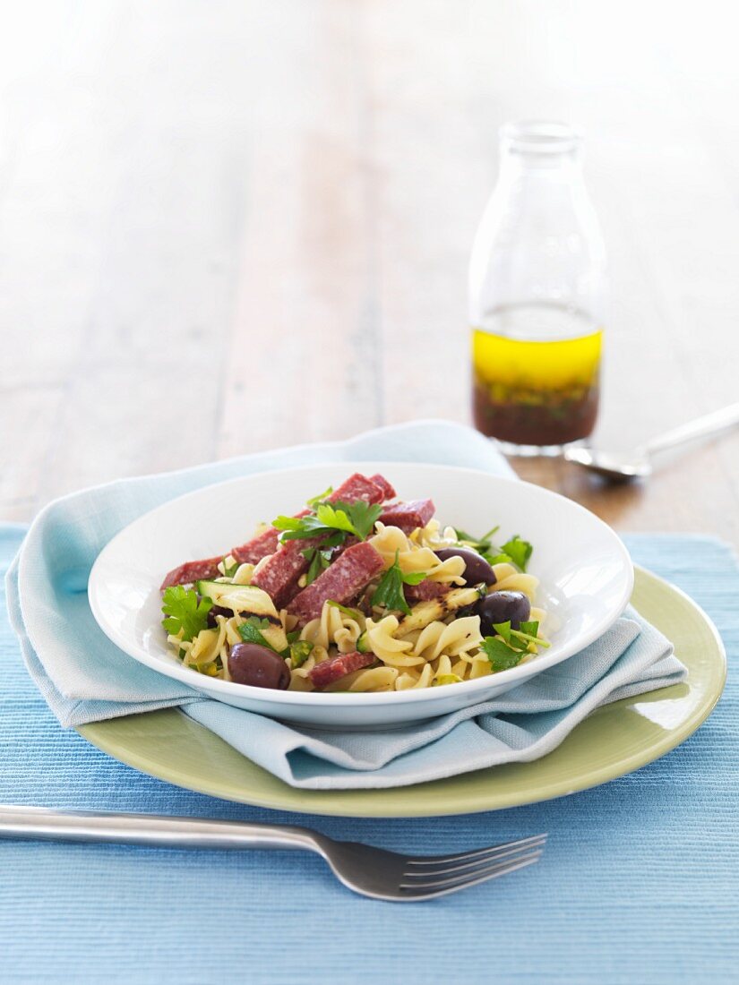 Pasta salad with salami and olives