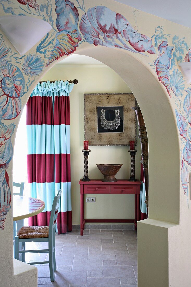 Open doorway to dining room with mural on wall (Villa Octavius, Lefkas, Greece)