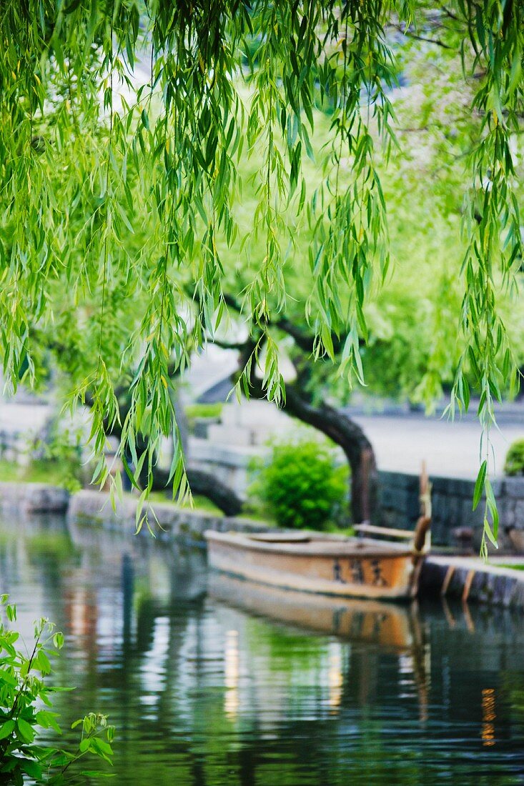 Boat Docked in a Japanese Canal