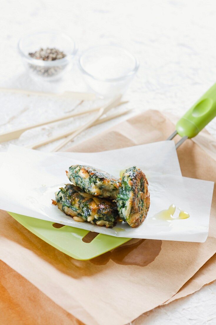 Spinach and pine nut cakes