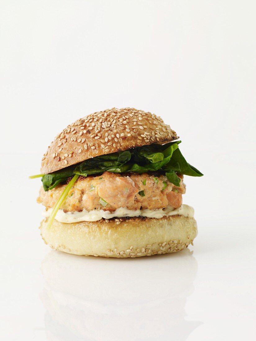 Salmon Burger on a Sesame Seed Bun; White Background