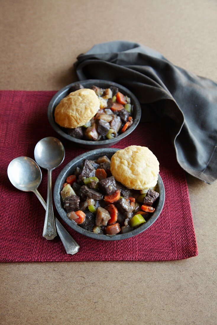 Bowls of Buffalo Stew with Biscuits