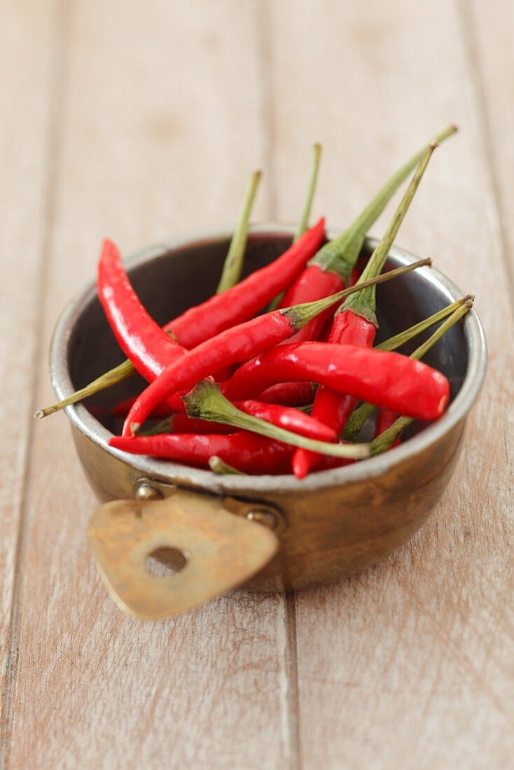 Fresh red chilli peppers in a bowl