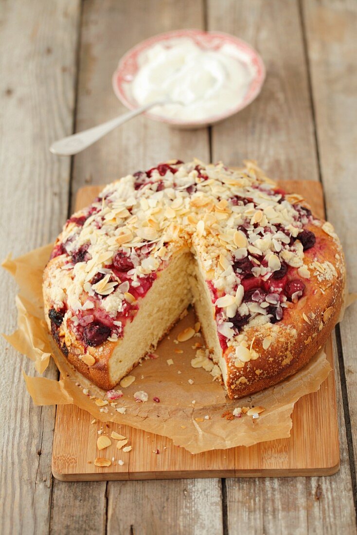 Yeast cake with cherries and slivered almonds