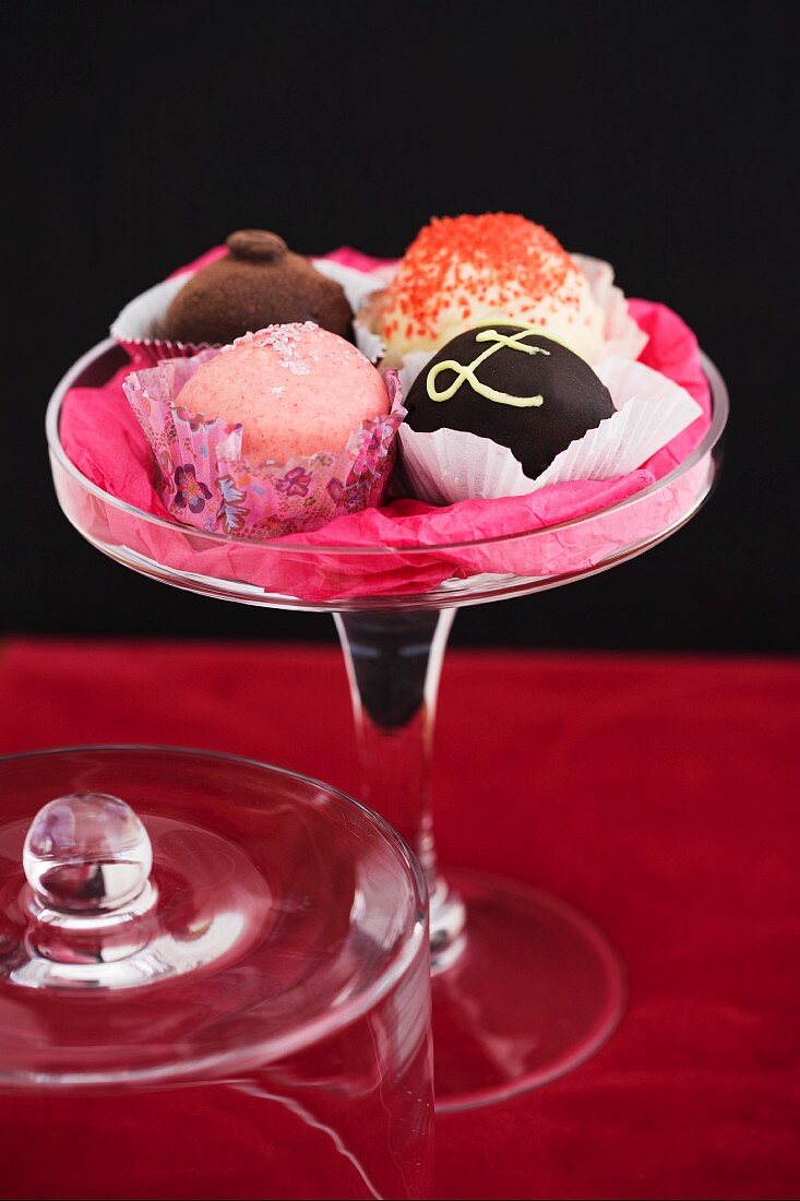 Various cake balls on a cake stand