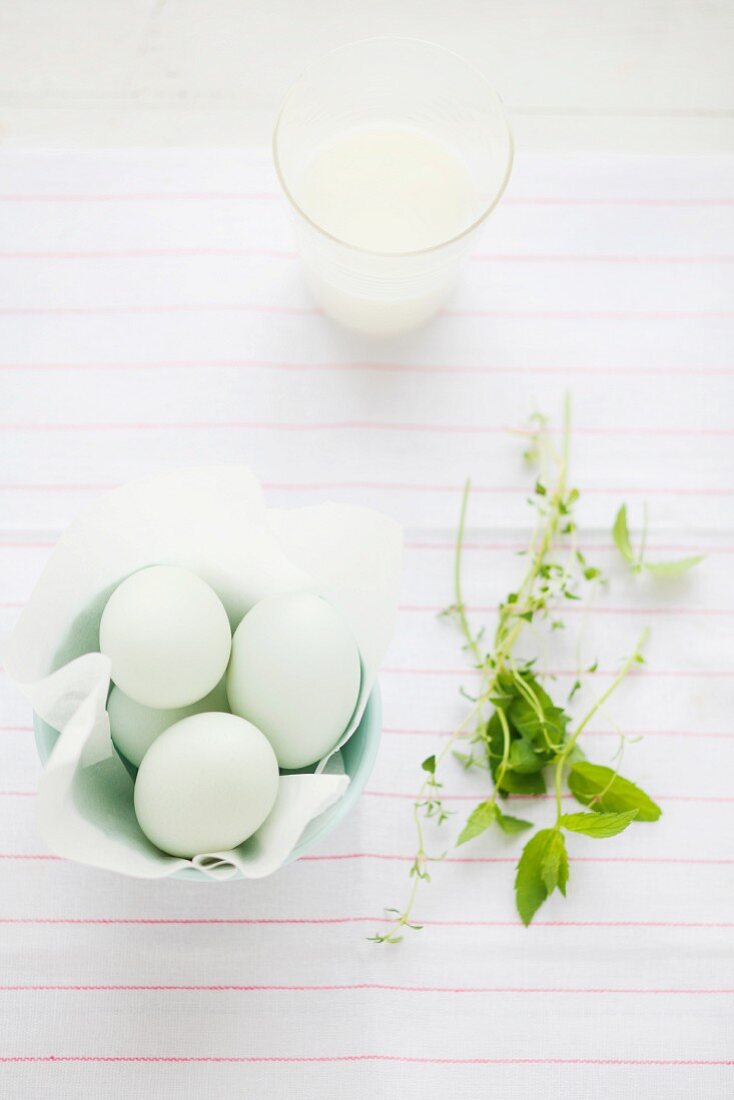 Eggs, milk and fresh herbs