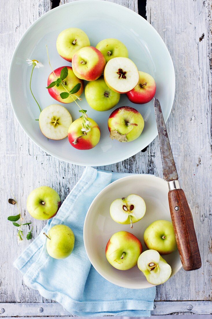 Apples, whole and cut into pieces