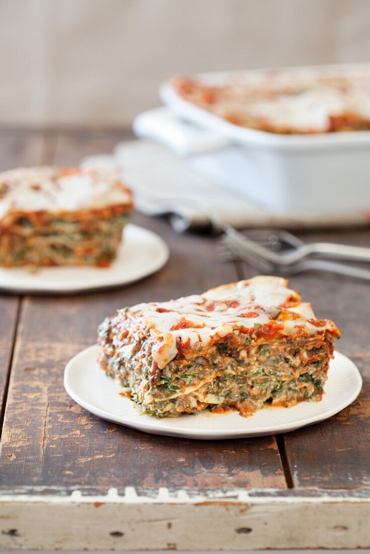Serving of Spinach and Lasagna on a Plate