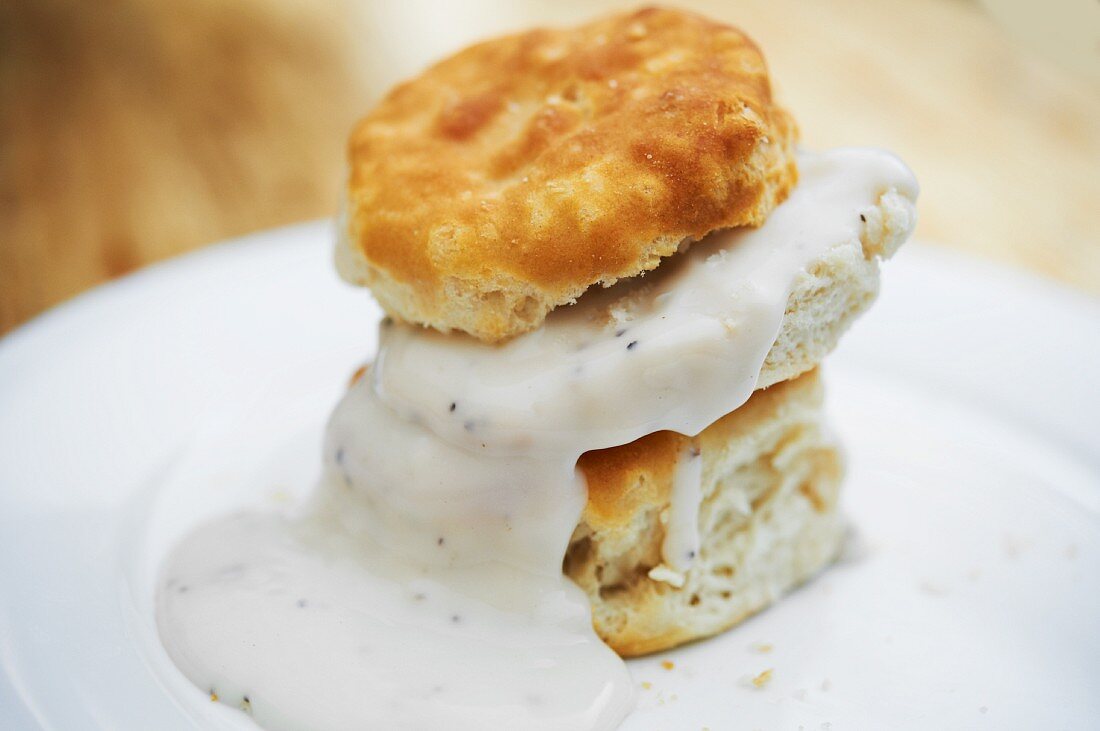 Biscuit and Gravy on a White Plate