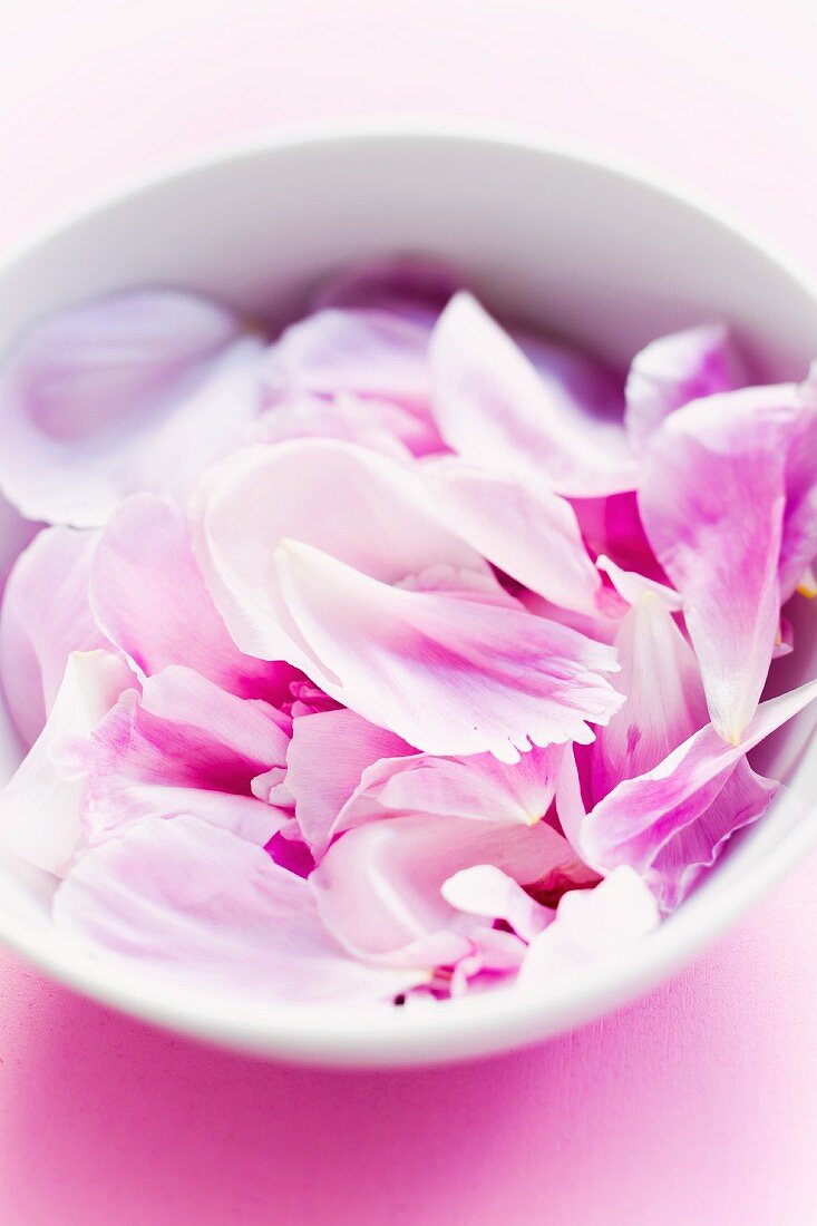 A bowl of pink rose petals