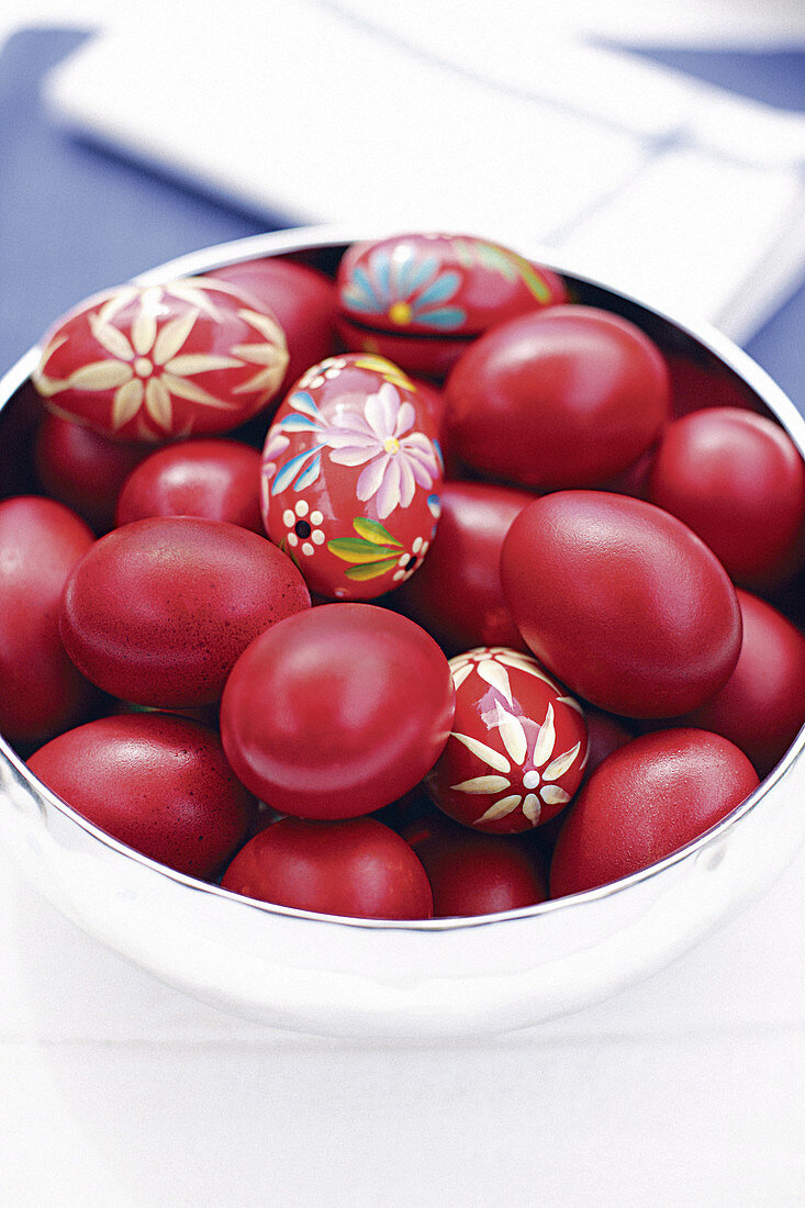 Eggs coloured red and decorated with flowers for Easter (Greece)