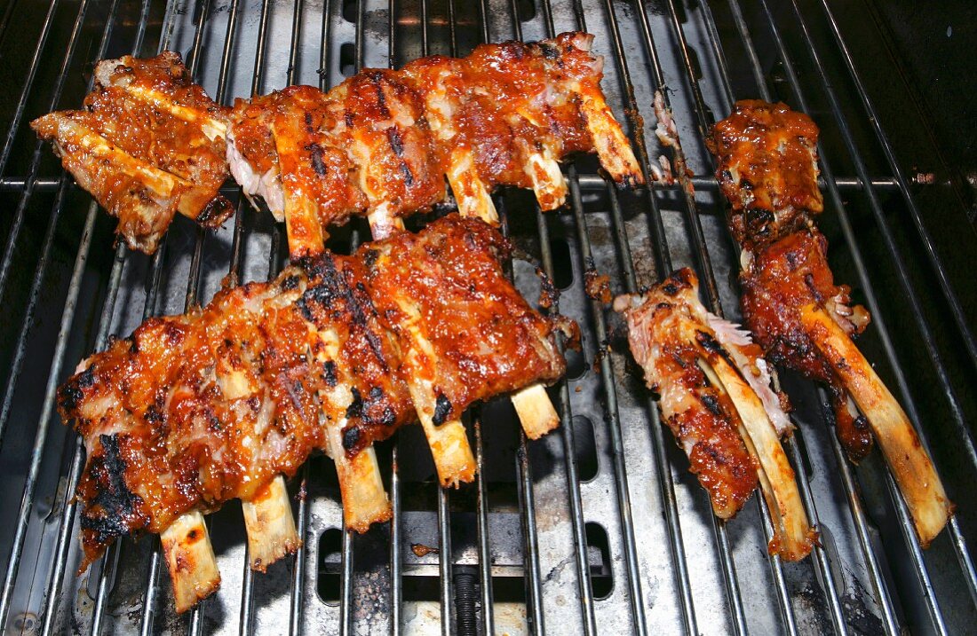 Marinated veal spare ribs on the grill