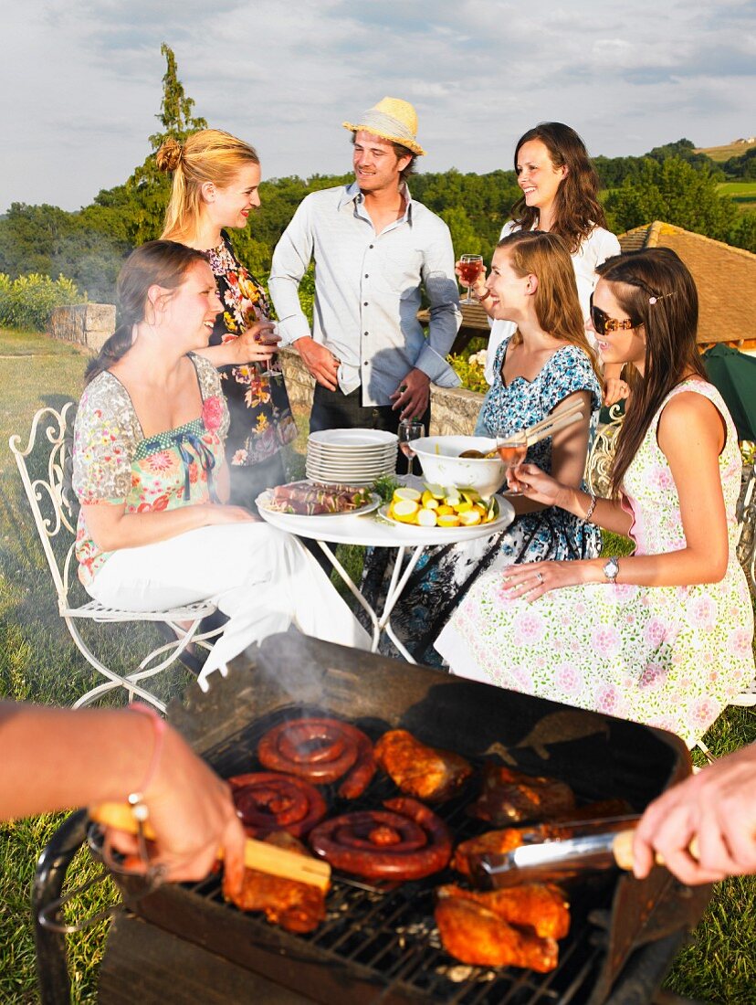 young people having barbecue