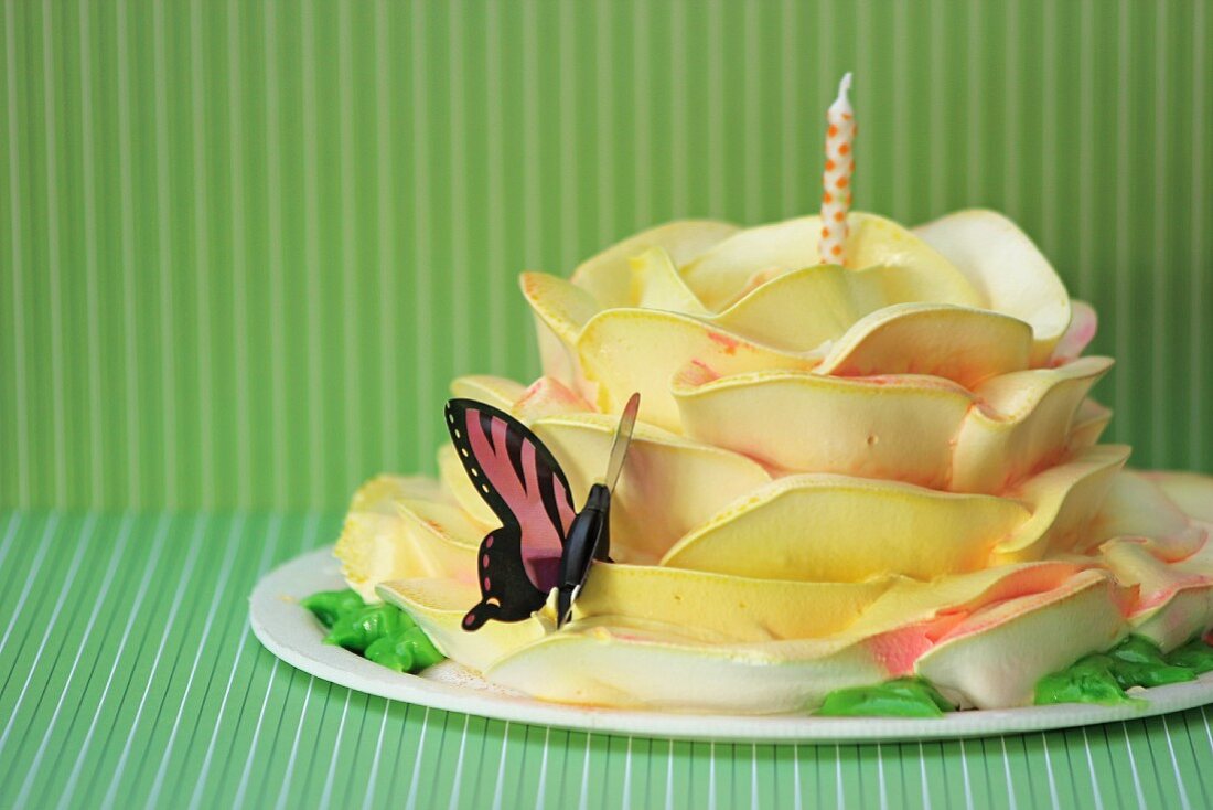 Rose Cake with Butterfly Decoration and a Polk-a-Dot Candle