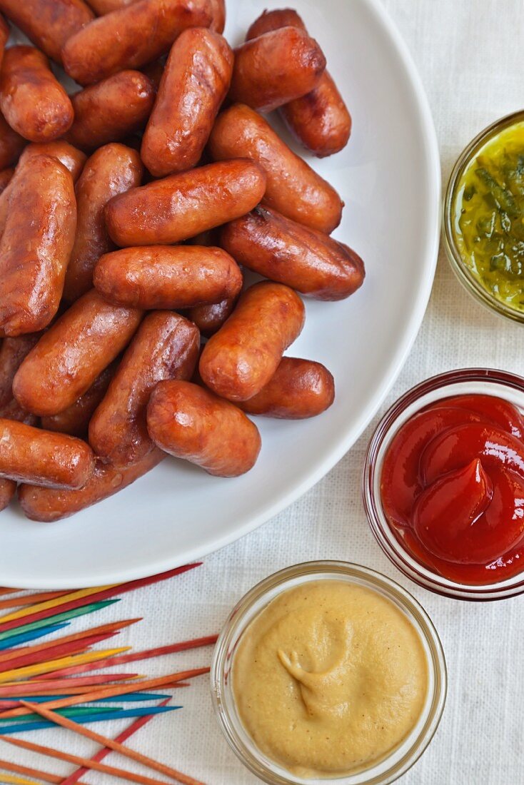 Cocktail Franks with Colored Toothpicks; Mustard, Relish and Ketchup