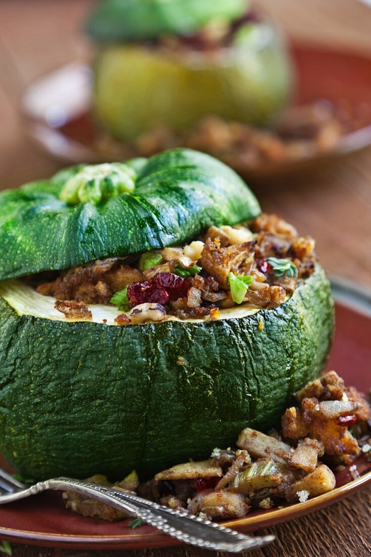 Acorn Squash Stuffed with Dried Cranberry, Apple Cinnamon and Corn Muffin Stuffing