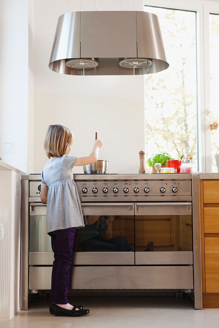 young girl cooking