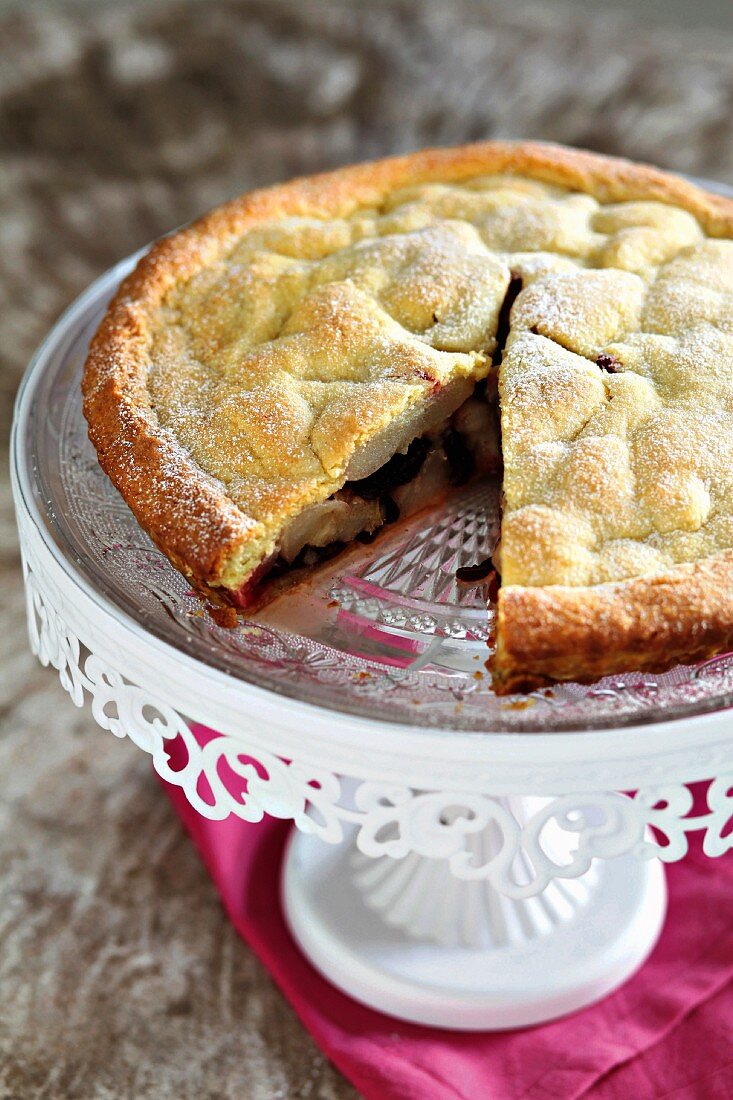 Warm apple pie with maraschino cherries