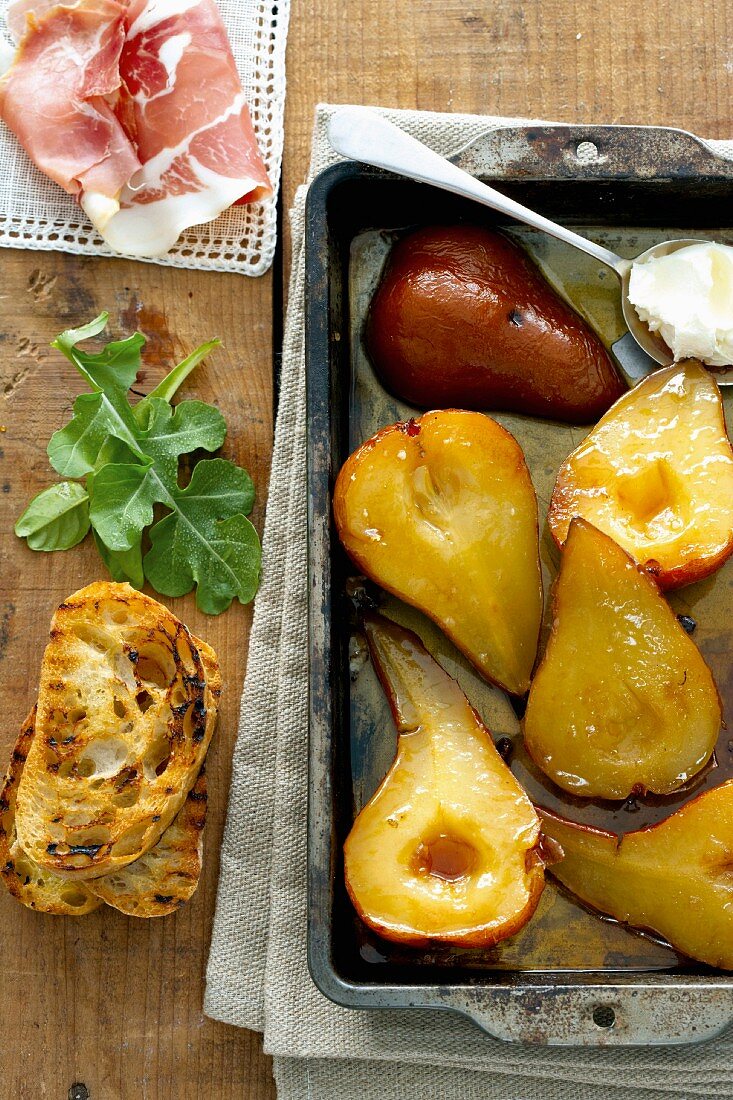 Caramelised pears with dry cured ham and grilled bread