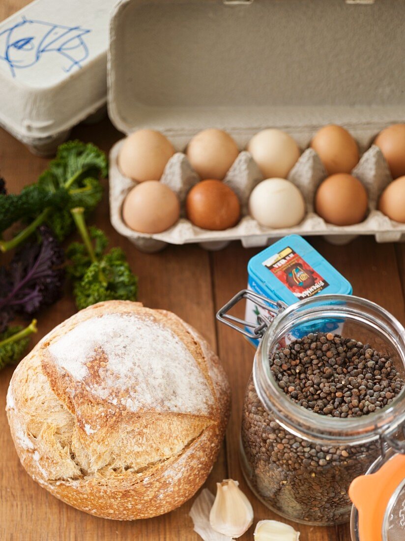 Assorted Ingredients: Lentils, Bread Loaf, Eggs and Kale