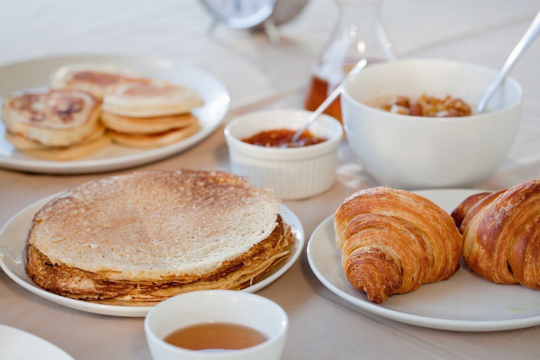 A breakfast of pancakes, croissants and flapjacks