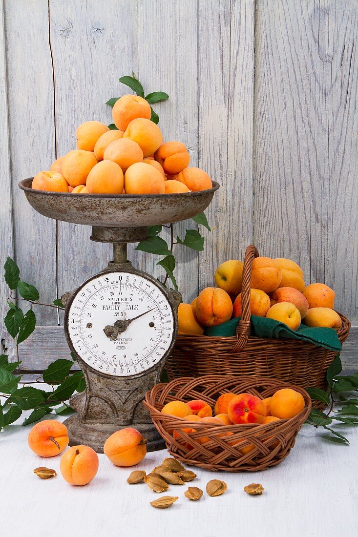 Apricots on a pair of scales and in baskets