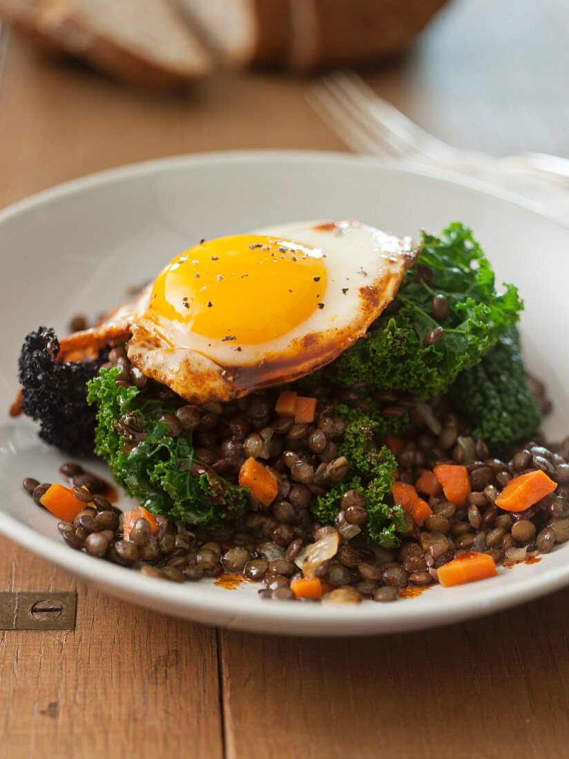 A Fried Egg Over Lentils and Kale