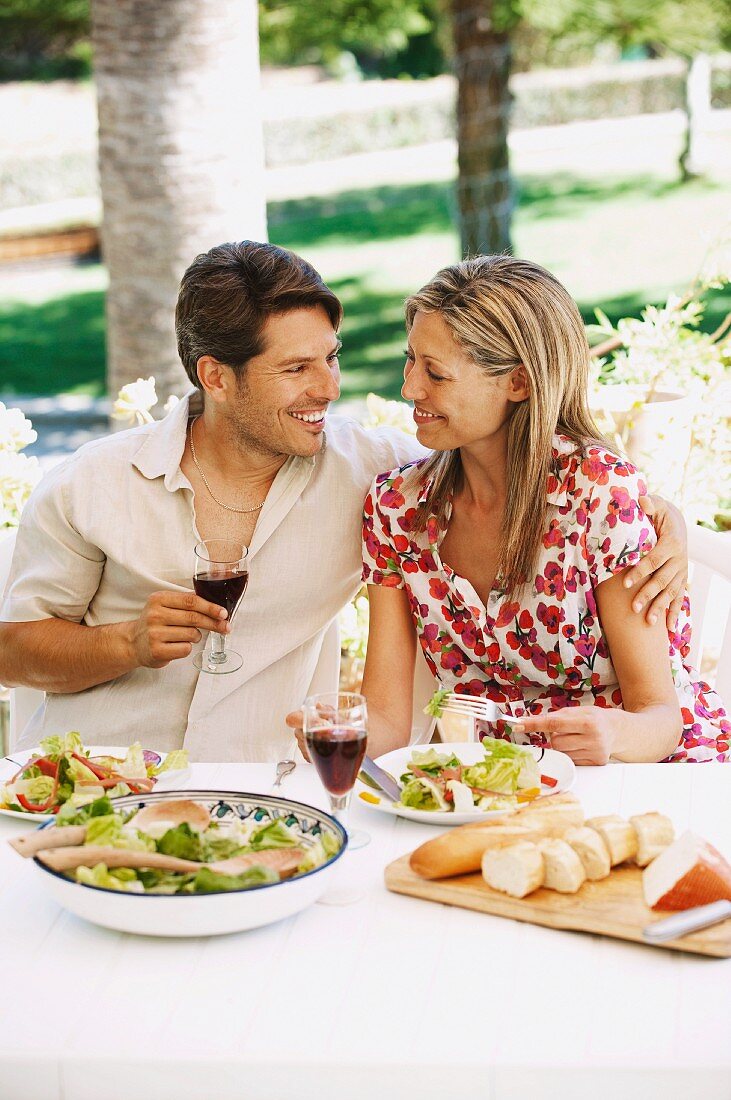 Couple eating outdoors