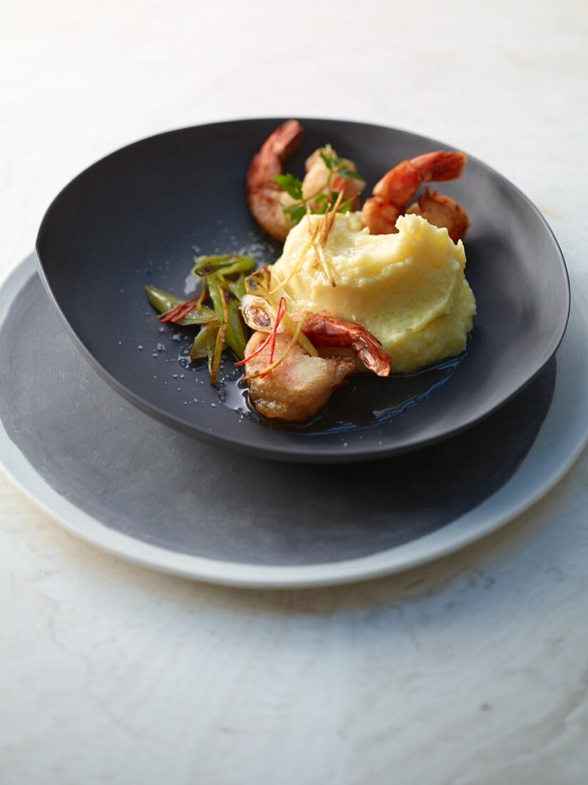 Coconut and potato puree with spring onions and chilli shrimps