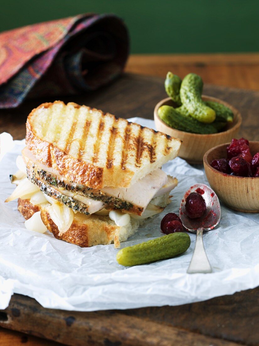 Turkey Panini Sandwich with Cranberry Sauce and Pickles