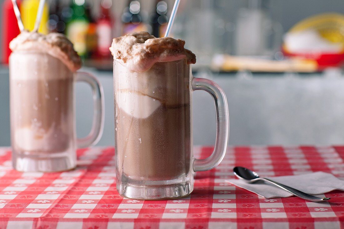 Two Root Beer Floats on a Table with Straws