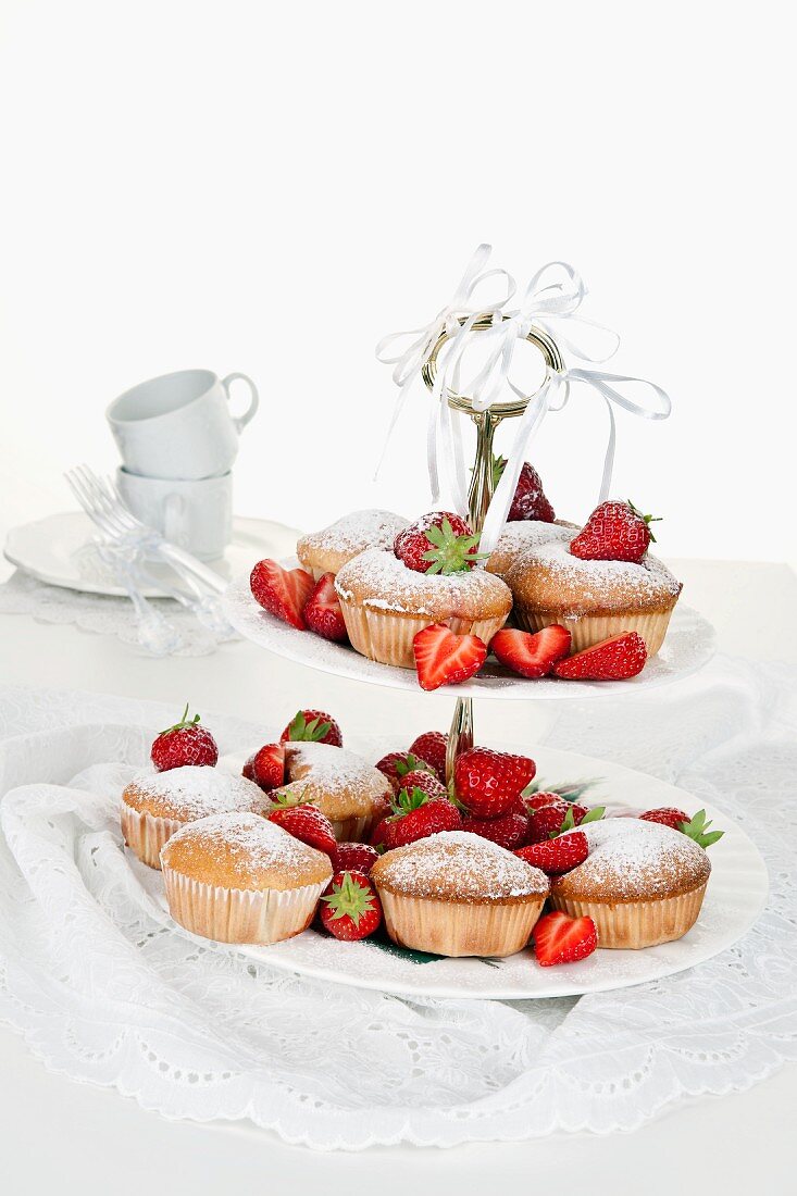 Strawberry and sour cream muffins on a cake stand